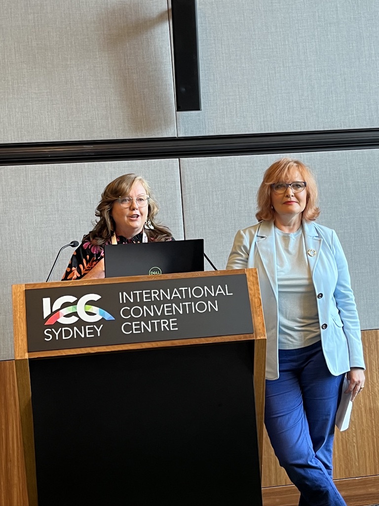 Associate Professor Johanna Lynch and Adjunct Professor Karen Price presenting at a lectern at the ICC Sydney International Convention Centre